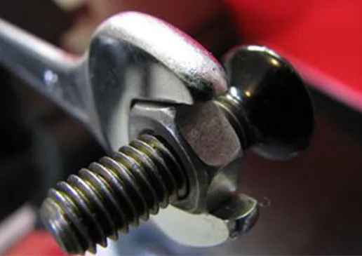 Wrench tightening a bolt